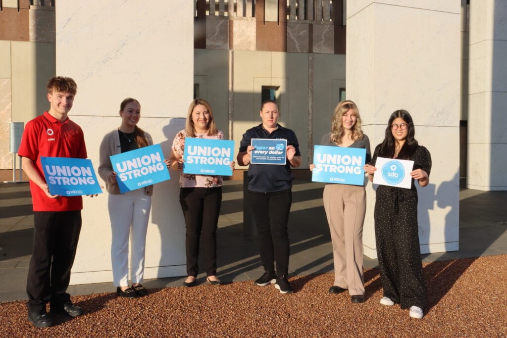SDA members outside of Parliament House campaigning for super on every dollar.